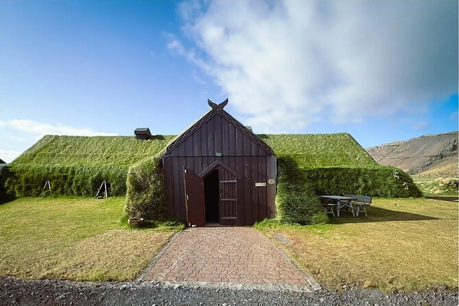 A turf-roofed timber house of the kind the Westfjords museums preserve